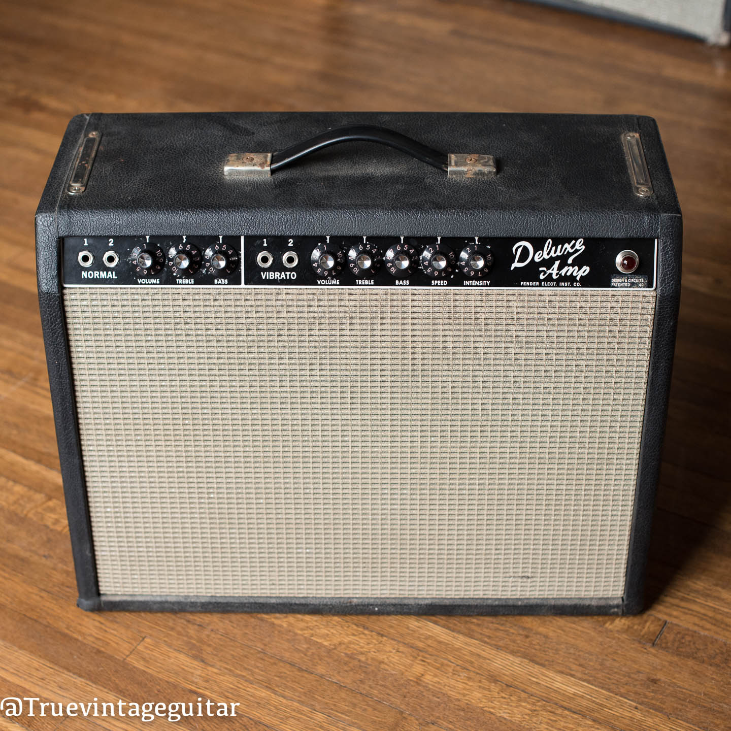 vintage 1965 Fender Deluxe black guitar amp