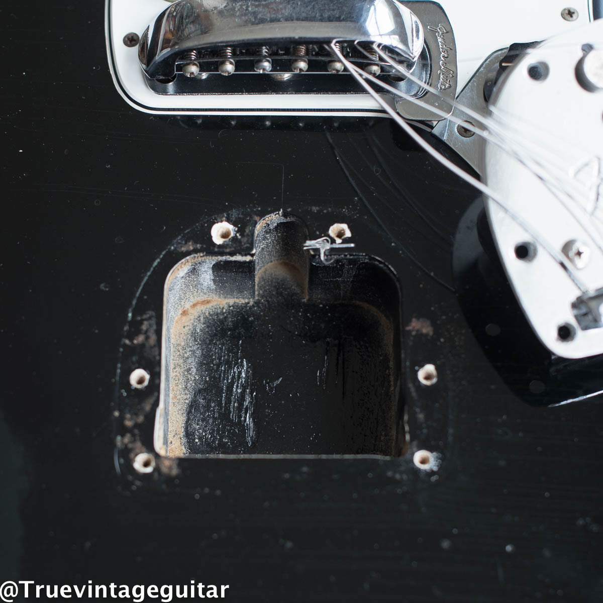 Tremolo cavity, vintage 1966 Fender Jaguar black