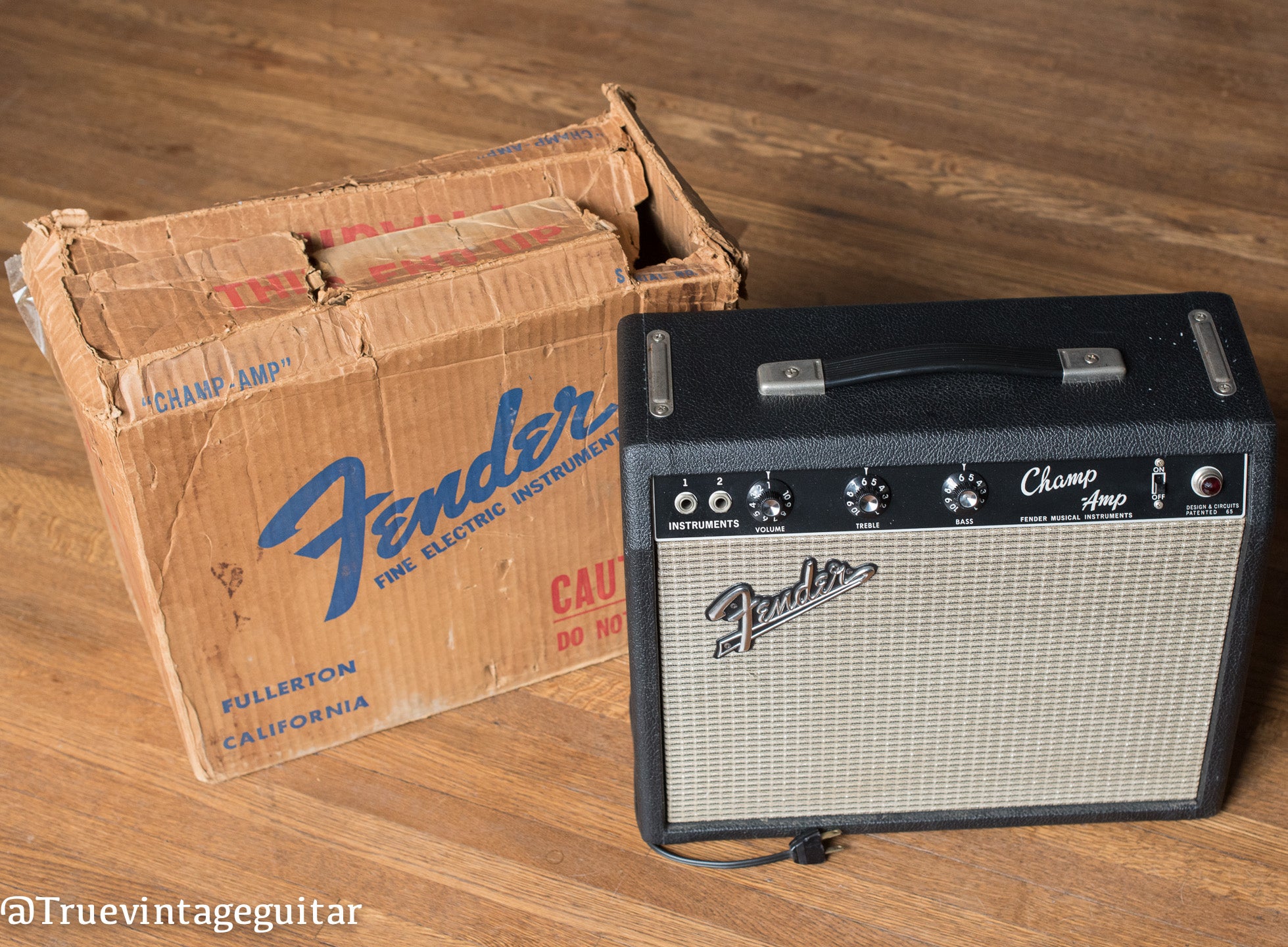 Vintage 1966 Fender Champ amp with shipping container