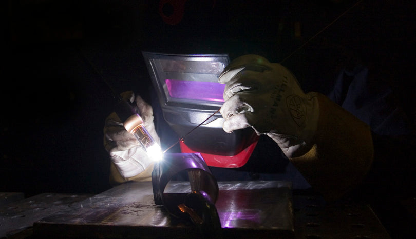 TIG welding on an intake adapter.