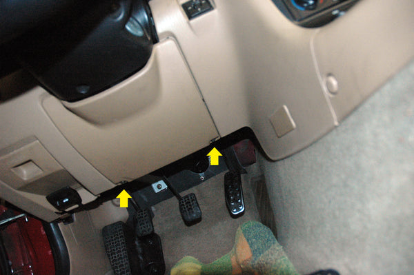 Fasteners under dash indicated with arrows.