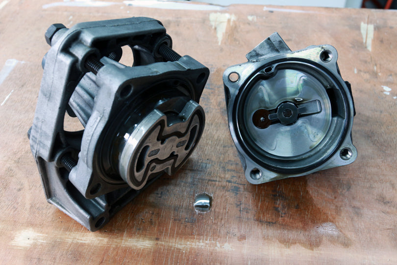 BMW E36 M3 power steering pump rebuild DIY. Pump separated into 2 halves.