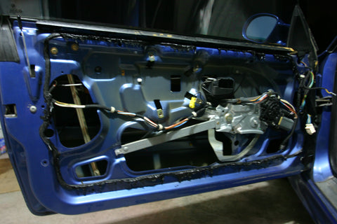 E36 door with vapor barrier removed.