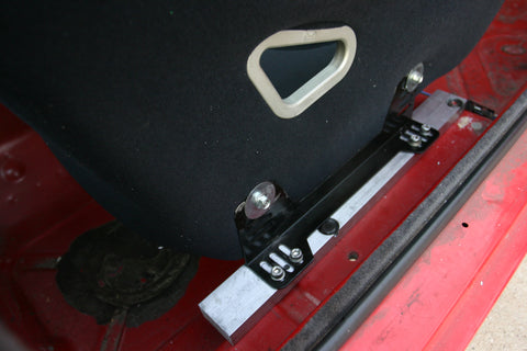 Stainless steel socket head cap screws attach the seat mount rails to the aluminum bar stock.