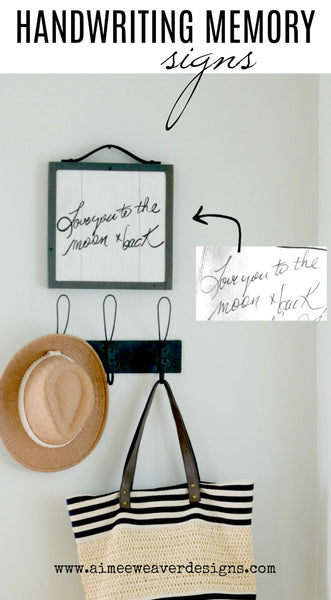 handwriting memory sign on wood "love you to the moon and back" hanging above hat and bag