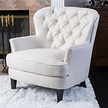 white upholstered chair