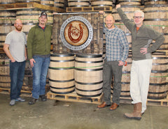 Repurposed oak whiskey barrel logo for High West Distillery. L to R: Bryce Hart (Innovative Metal Works), Erik Fitchett (High West), Daniel Salmon (Material Resourcers), David Perkins (High West Distillery Founder). Photo courtesy: Benjamin Siler