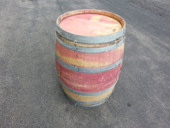 Beautiful red wine barrels feature solid oak and steel construction with unique coloring.  