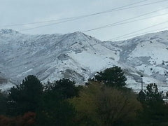 Snow begins to settle on the Wasatch Range.  
