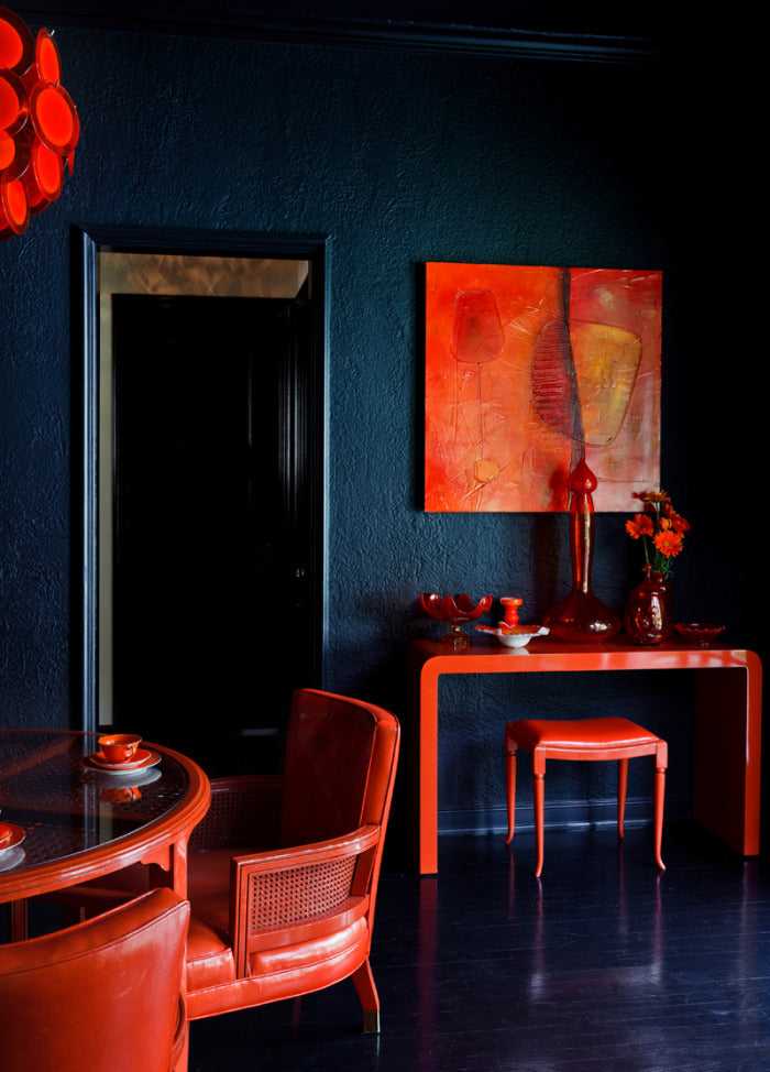 Tamara Kaye-Honey House of Honey room. Red on ultra dark blue background