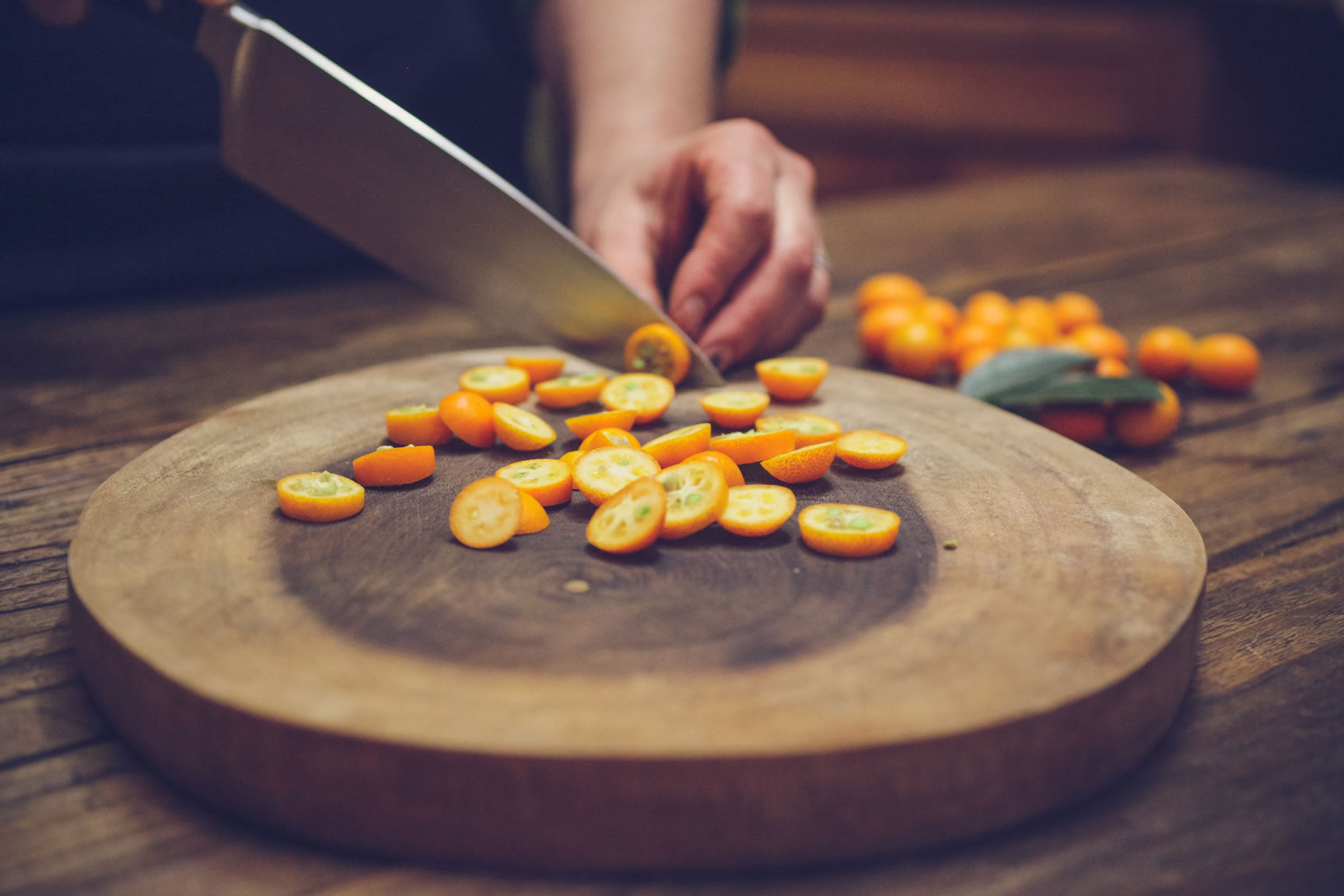 slice kumquats