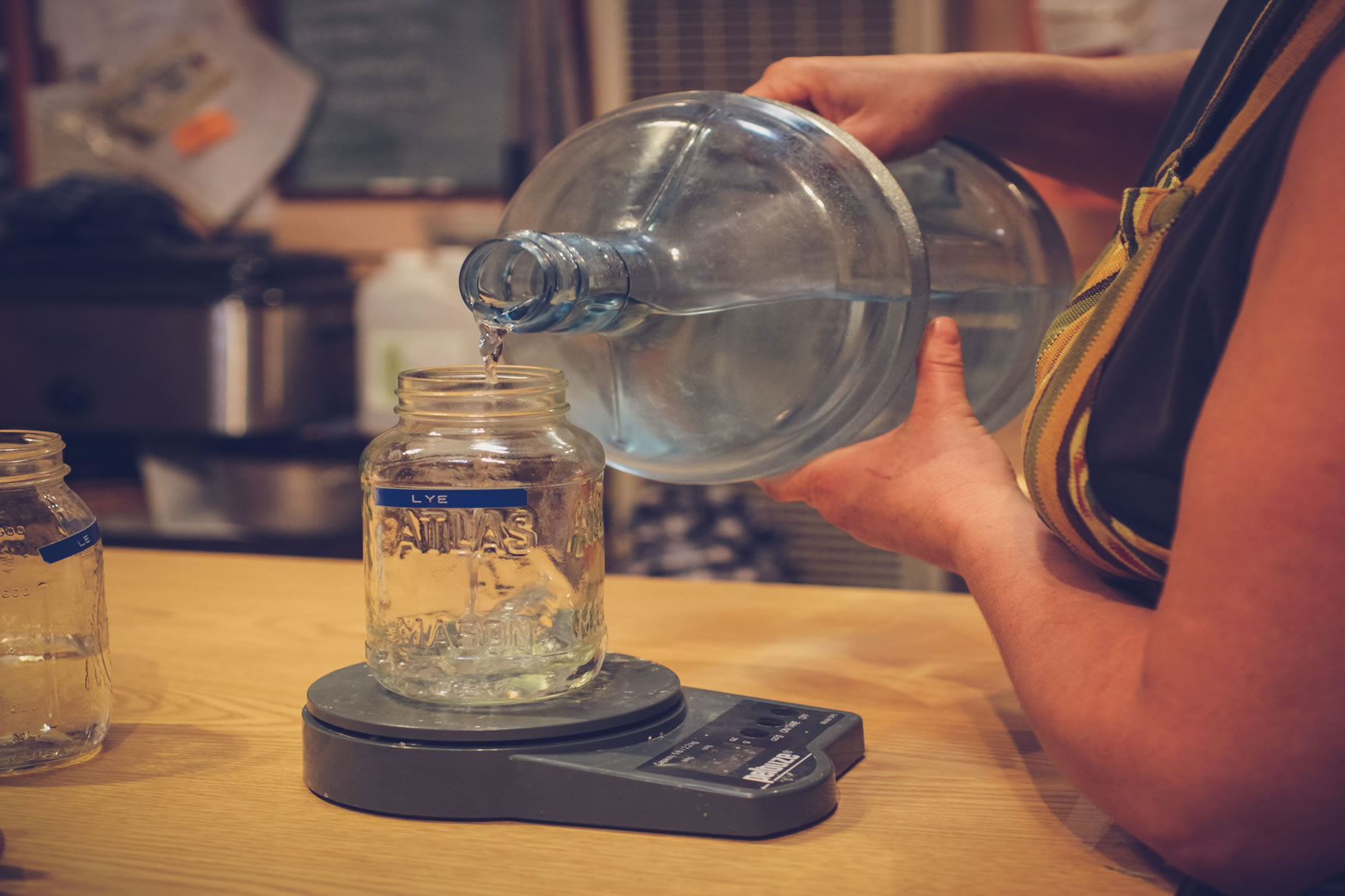measure water into jar