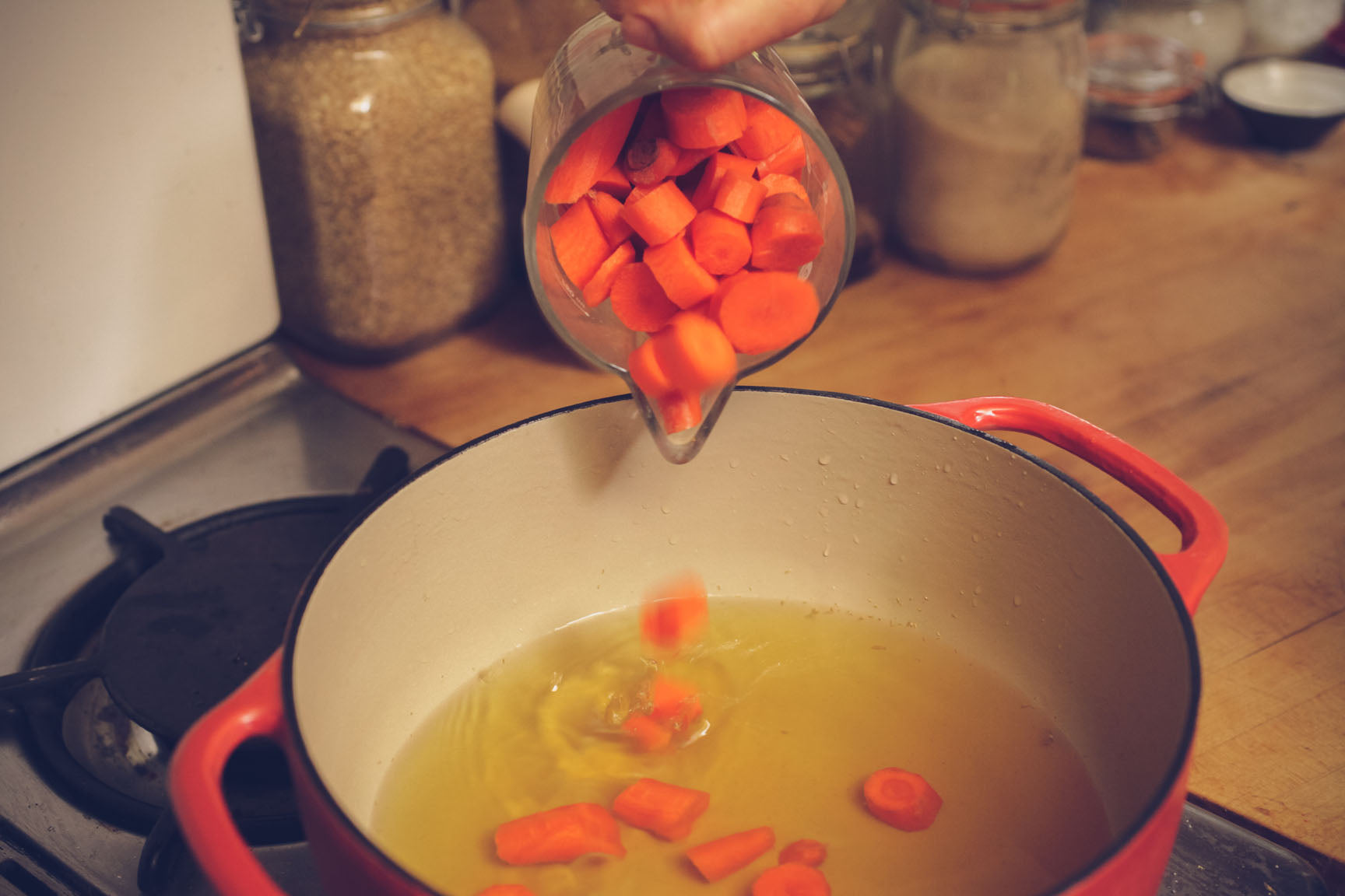 add carrots to stock pot