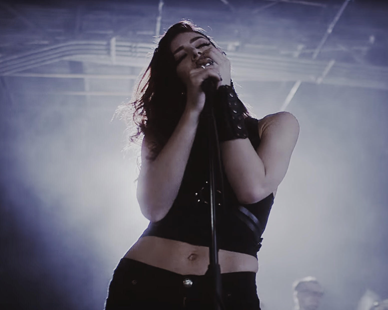 Chrissy Costanza of Against the Current wears JAKIMAC D-Ring Harness, Kingly Crown, and Warrior Cuff in "Talk" Music Video