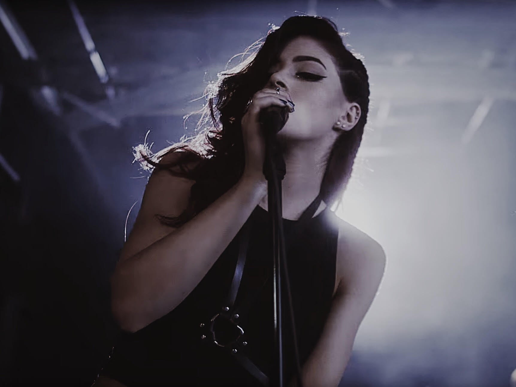 Chrissy Costanza of Against the Current wears JAKIMAC D-Ring Harness, Kingly Crown, and Warrior Cuff in "Talk" Music Video