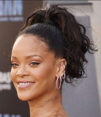 Rihanna with a high ponytail