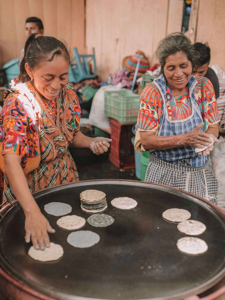 Women making tortillas in Chichi, Guatemala