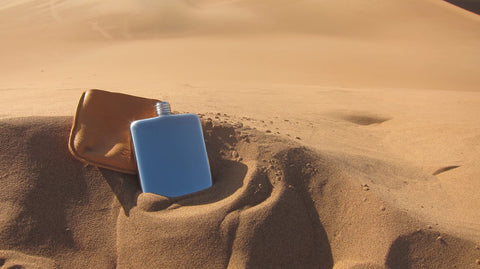 SWIG Flasks in the sand dunes
