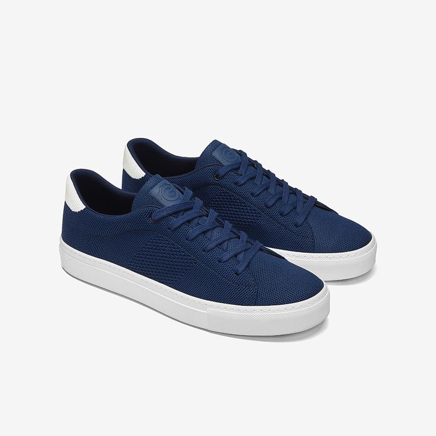 navy and white sneakers