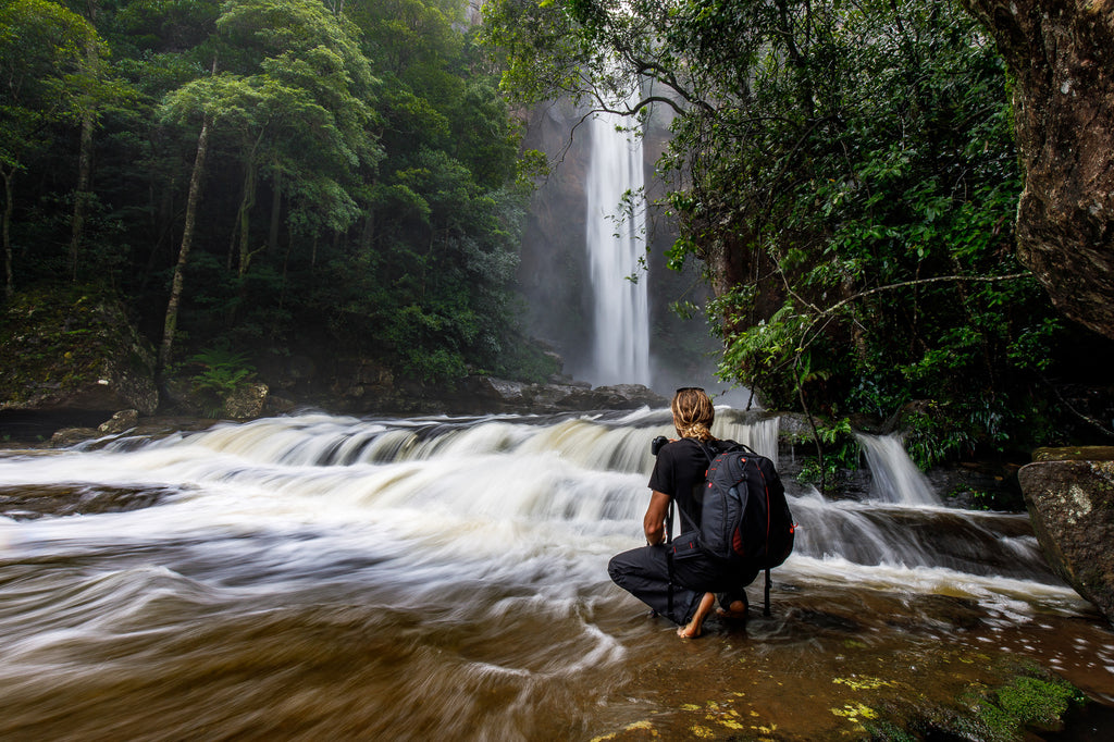 Thurston shooting landscape photos of Belmore falls