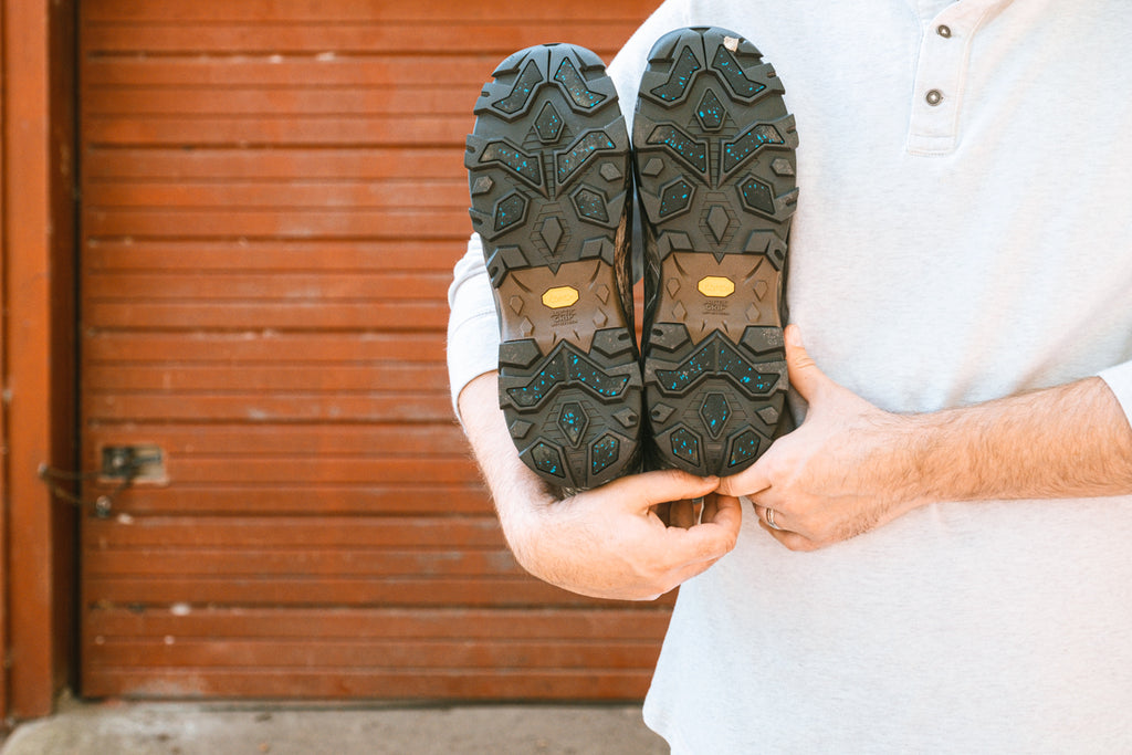 holding favorite pair of muck boots