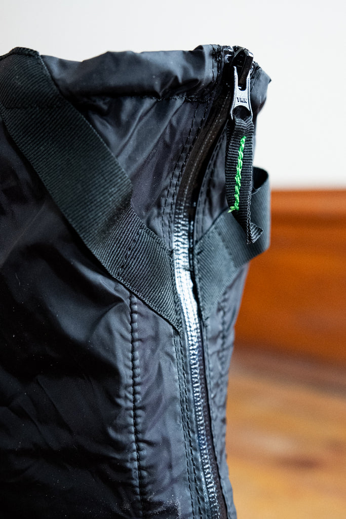 close up of zipper of TUKX OverShoe Backzip