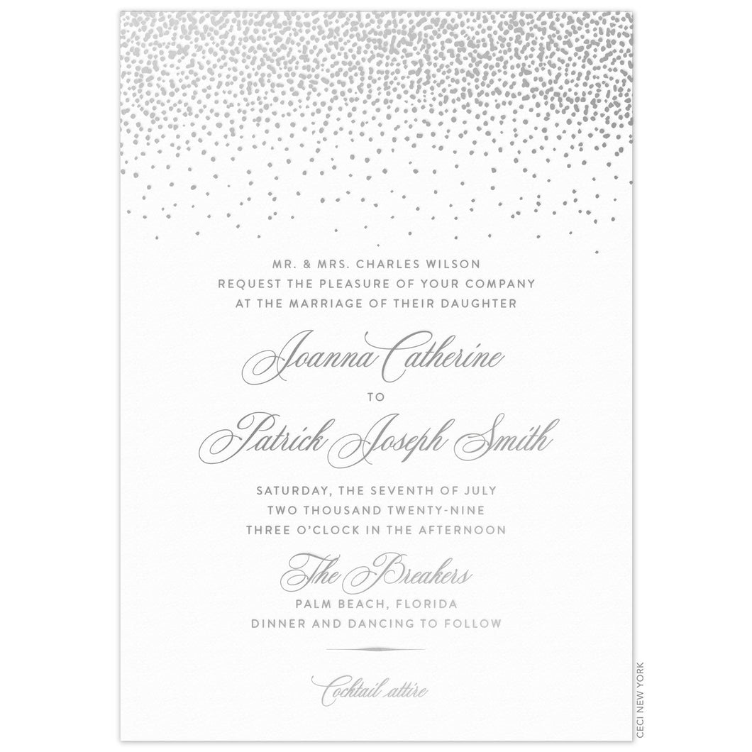 a white paper invitation with silver dot pattern at top and silver script and block font