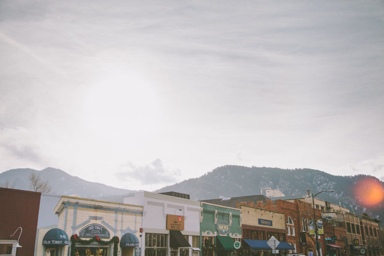 Photo of boulder shops with mountains