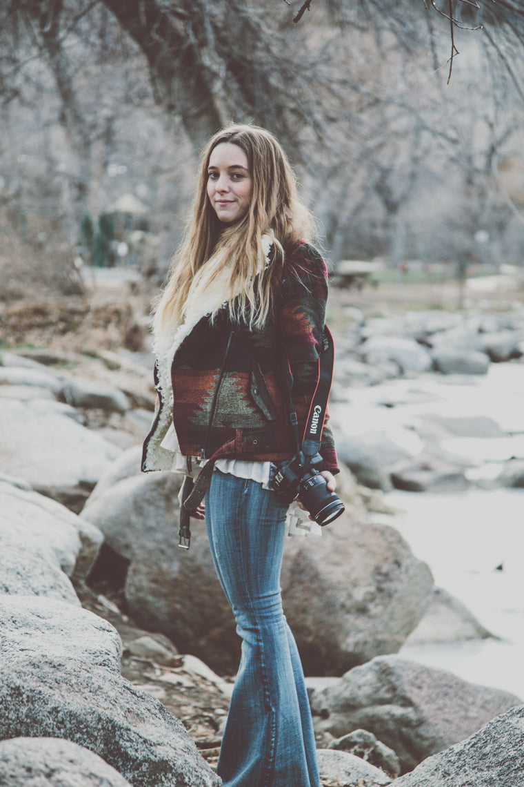 Photo of beautiful bohemian girl in rocks in boulder colorado