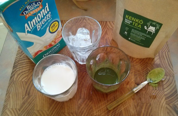 Ingredients for an iced almond milk matcha latte, with almond breeze and kenko matcha tea