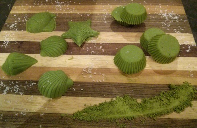 Matcha Green Tea Chocolates on chopping board with coconut