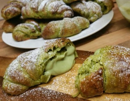 Double matcha green tea croissant with flaky matcha pastry filled with matcha custard