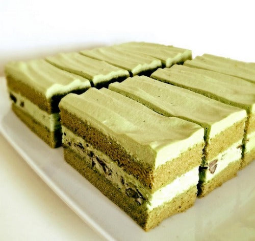 Double Matcha Mousse Cake filled with Adzuki beans. The fluffy matcha sponge cake layers with matcha creamy mousse 