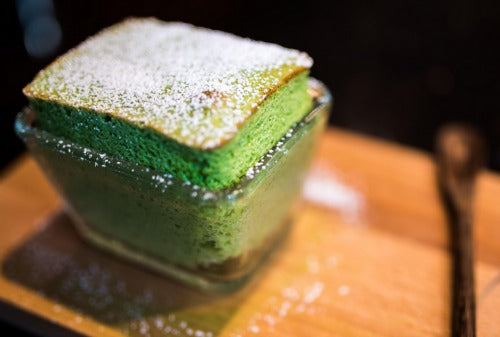 Classic green tea matcha souffle cake is soft and fluffy with a beautiful vibrant green color.