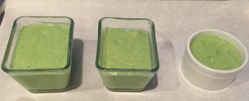 Ramekins of matcha green tea souffle batter before baking time