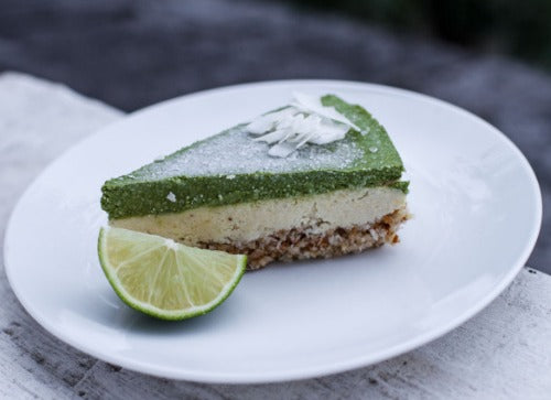 A slice of deliciousness from raw coconut pine lime cheesecake with the subtle hint of matcha green tea 