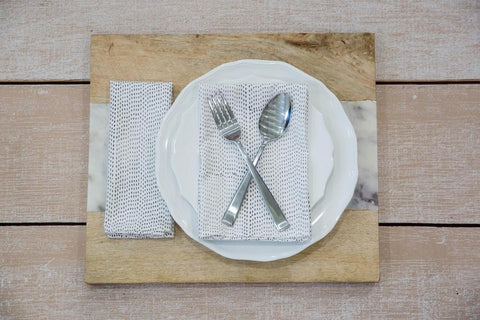 Whether you're throwing a sustainable dinner party or just enjoying a quiet meal alone, these Grey Dots Cloth Napkins from Passion Lilie are an easy way to step up your dinner game with sophistication and sustainability.