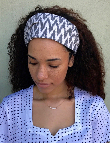 This white-and-gray zigzag Chevron Headband from Passion Lilie is a great accessory for keeping your hair out of your face while still looking stylish at any music festival.