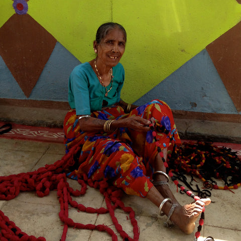 A hand loom weaver in India.