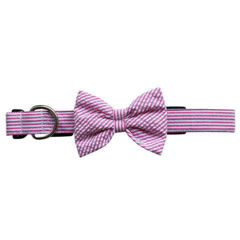 This Seersucker Bow Tie Dog Collar from NOLA Couture features pink and white stripes on its 1-inch collar and attached bow tie.