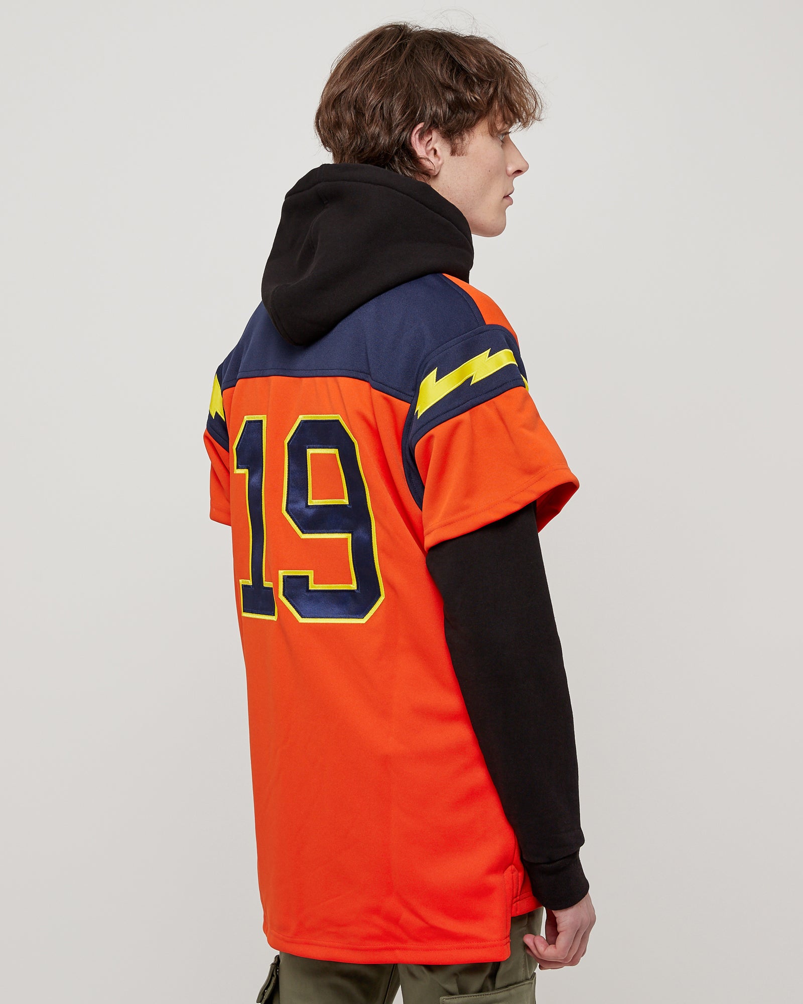 football jersey over hoodie
