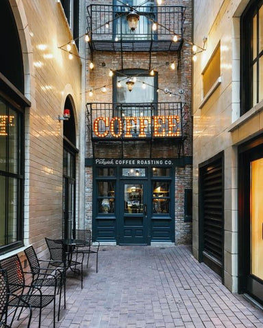 coffee shop exterior string lights