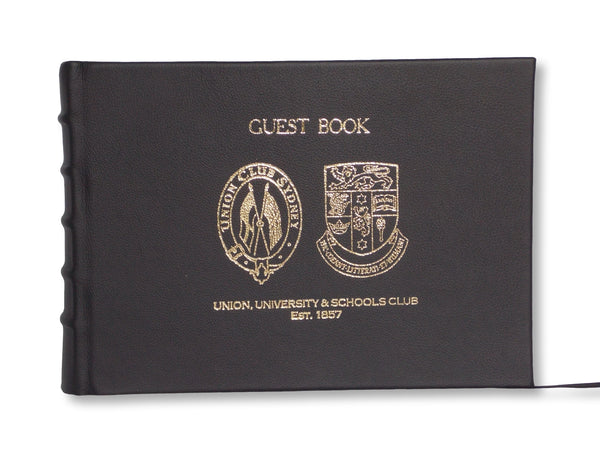 Black leather corporate guest book with stamped logo