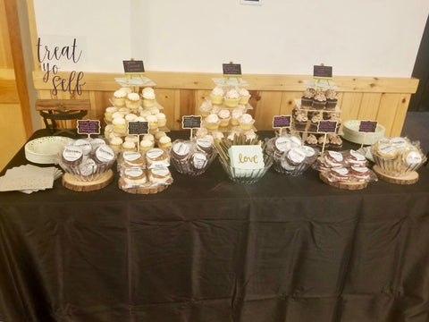 wedding dessert table with whoopie pies and cupcakes