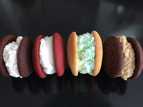 four whoopie pies of assorted flavors