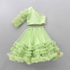 Pre Order: Green One Shoulder Top With Frilly Ghagra And Dupatta