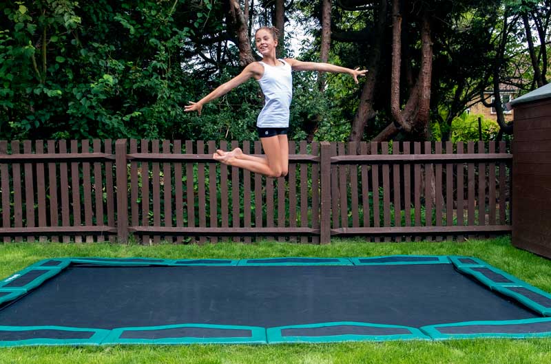 Amelia on in-ground trampoline