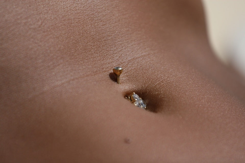 belly button piercing pain blog image