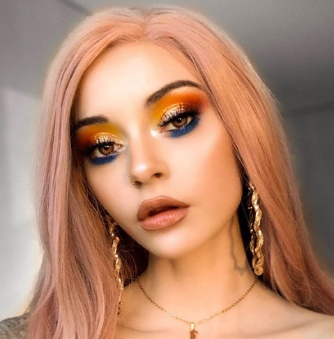 Jade with spotlight orange makeup