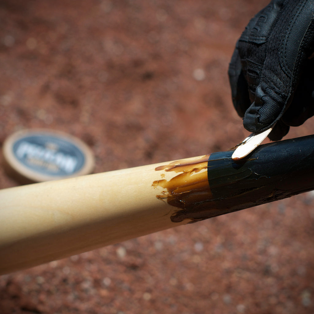 Baseball Bat With Pelican Grip Dip Pine Tar and Rosin Blend